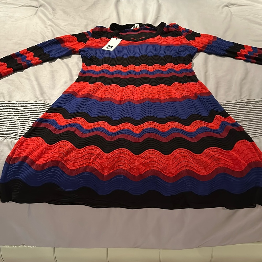 Brand new dress with tag. Size M-L. Good for any occasion.